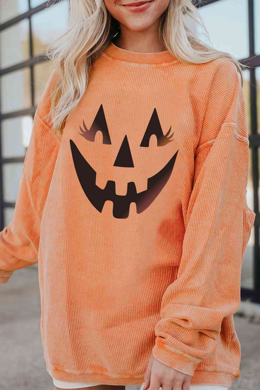 Round Neck Dropped Shoulder Jack-O'-Lantern Graphic Sweatshirt Trendsi