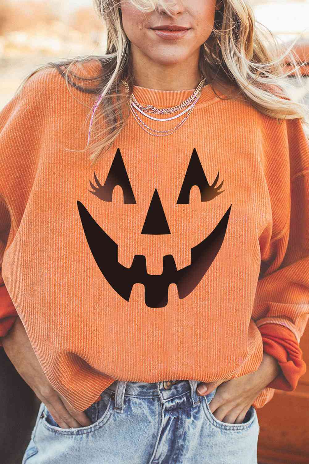Round Neck Dropped Shoulder Jack-O'-Lantern Graphic Sweatshirt Trendsi